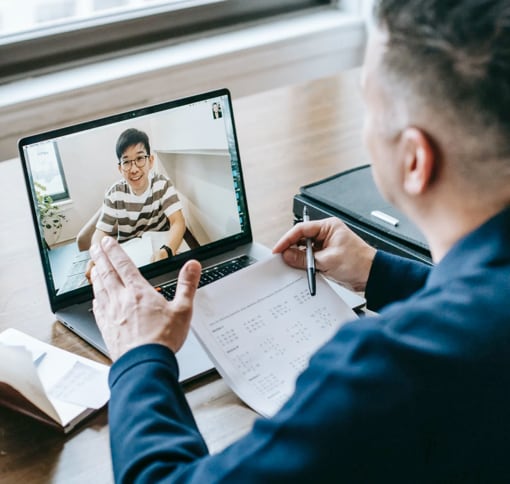 Two men in a video call for a meeting